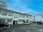 マンション外観。生活利便性に優れた立地環境。