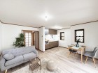 LDK14帖。のびのびとくつろげるリビングは、家族のコミュニケーションの場として、みんなが集まる一番の場所に。